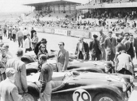 1956 Le Mans; Richardson in foreground with ever-present cigarette